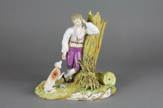 A "Meissen" figure of a standing woodsman with seated dog 9"