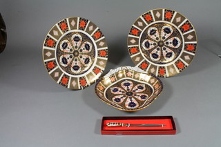 2 Royal Crown Derby Imari pattern plates 10", a scallop shaped ditto dish 8" and a Royal Crown Derby paper knife