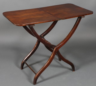 A Victorian rectangular mahogany folding coaching table raised on X framed legs, 28.5"h x 35"w x 19"d