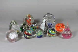 A collection of modern glass paperweights