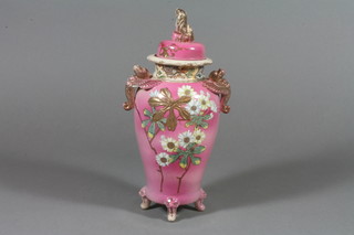A Japanese ovoid vase and cover, the pink ground decorated with flowers 11"