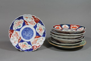 7 19th Century Imari plates, a Celadon ditto