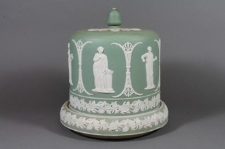 A 19th Century Highdown cheese dish and cover, the pale green Jasper ground decorated with classical figures and floral decoration 10"
