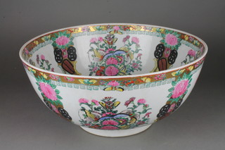 A 20th Century famille rose punch bowl decorated with flowers 16"