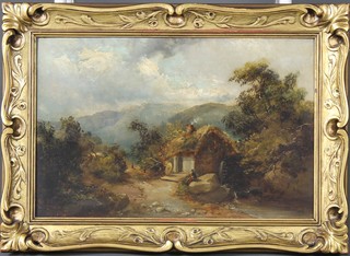 E Niemanns, oil, a 19th Century landscape view of figures before a cottage and a country lane and mountains, signed 13" x 19.5" ILLUSTRATED