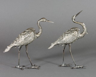 A pair of white metal repose figures of Ibis 7" ILLUSTRATED