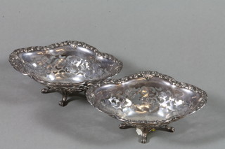A pair of pierced sterling quatrefoil bon bon dishes, 6" 
