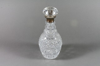 A cut crystal mallet decanter with silver collar, London 1972 ILLUSTRATED