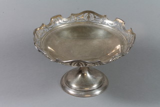 An Edwardian silver tazza with pierced rim on waisted stem and spreading foot, Sheffield 1909, maker Martin Hall & Co, 20 ozs 