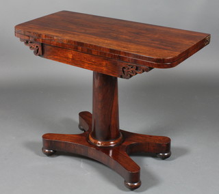 A William IV rosewood D shaped tea table, raised on a turned  column with shaped base 29"h x 36"w x 18"d