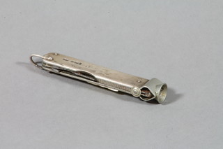 A silver cigar cutter/piercer 