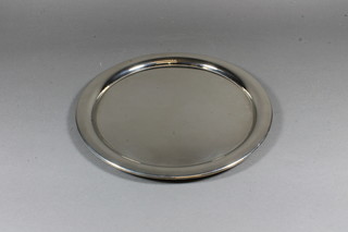 A circular silver plated tray 12"