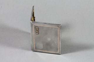 An Art Deco silver cigarette case with engine turned decoration, inlaid gold, Birmingham 1920, 5 ozs
