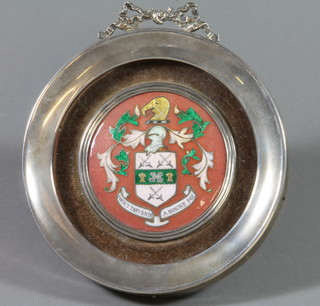An Edwardian circular silver easel photograph frame Birmingham 1900, the centre set a porcelain plaque - the arms of The Company of Cutlers in Hallamshire ILLUSTRATED
