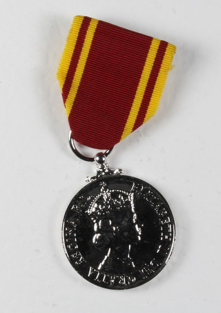 An Elizabeth II issue Fire Brigade Long Service Good Conduct medal to Station Officer Brian D Peck, cased