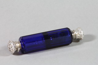 A Victorian octagonal blue glass double ended scent phial with silver lids 5" (stopper missing)