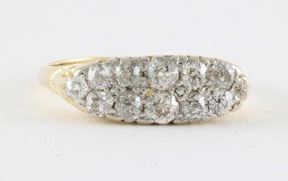 A lady's 18ct yellow gold dress ring set 12 diamonds