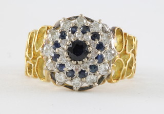A lady's 18ct pierced yellow gold cluster dress ring set sapphires and diamonds