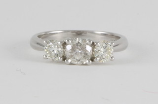 An 18ct white gold dress ring set 3 diamonds approx. 1.31ct