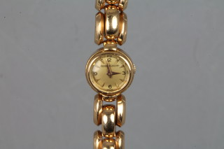 An 18ct gold cased wristwatch by Jaeger Le Coultre contained on an integral bracelet ILLUSTRATED
