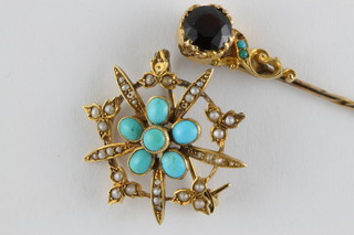 A gold brooch set turquoise together with a stick pin