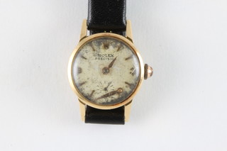 A lady's Rolex wristwatch contained in an 18ct gold case