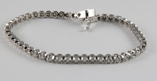 An 18ct white gold bracelet set diamonds