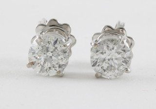 A pair of 18ct gold screw back earrings set diamonds, approx. 2.05ct 