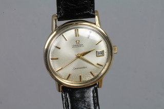 A gentleman's Omega Seamaster automatic wristwatch contained in a 9ct gold case ILLUSTRATED