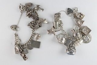 2 silver curb link charm bracelets hung numerous charms 47.3 grams