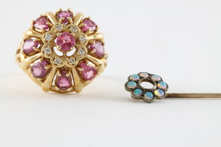 A 14ct gold dress ring set pink stones together with a stick pin set an opal