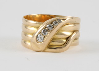 A gentleman's 18ct gold dress ring in the form of a serpent set diamonds 