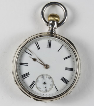 A Victorian keyless open faced pocket watch with enamelled dial by the AM Watch Co. contained in a silver case Chester 1879
