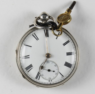 A Victorian silver key wind pocket watch by G Goodridge contained in a silver case London 1877