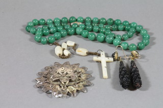 A green hard stone necklet, a pair of jet club shaped earrings and various costume jewellery