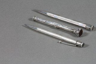 2 yards of lead contained in Sterling silver cases together with a silver plated dip pen/propelling pencil