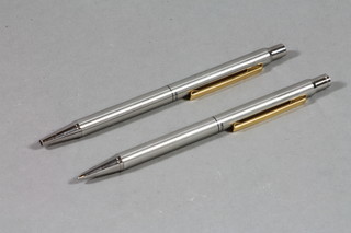 An Inoxcrom ball point pen together with a propelling pencil