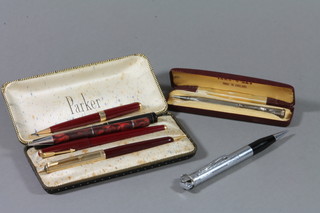 The Salisbury no.2 fountain pen by W Straker Ltd, 2 red Parker fountain pens, 3 propelling pencils and a yard of lead 