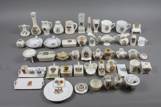 A large collection of crested items