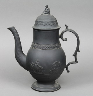 A black basalt baluster teapot decorated with classical figures in landscapes, the lid with figural finial 11" 