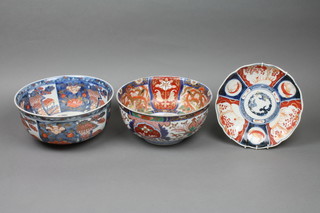A deep Imari bowl decorated panels of dragons and flowers, with 6 character mark to the base 10", a ditto with an urn of flowers and panels of flowers 10" and a scallop dish 8 1/2", all af, 