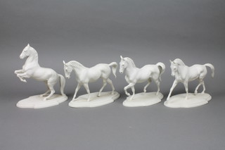 A set of 4 modern bisque figures of horses 6" 