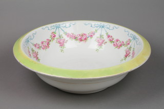An Edwardian white glazed wash bowl with floral decoration 17" 