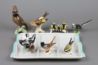 A rectangular turquoise glazed Poole Pottery hors d'eouvres dish 13" and a collection of 8 Goebel figures of birds
