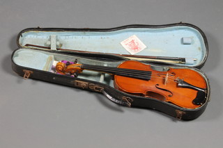 A Karl Bitterer violin, labelled Karl Bitterer Mittewald with 13 1/2" two piece back, contained in a fibre case