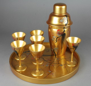 A Japanese Art Deco lacquered cocktail set comprising tray 12", cocktail shaker 10" and 6 goblets