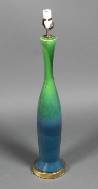 A Studio ceramic turquoise and green slip glazed elongated over form vase, converted to electricity  24" 
