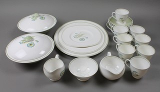 A Susie Cooper Katina design dinner and tea service comprising 2 tureens and covers, a sauce boat and stand, 5 saucers, 8 cups, 1 large plate, 2 oval meat plates and a milk jug