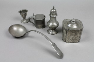 A square pewter caddy 3", 2 pewter quarter gill measures, ditto egg cup, sugar caster and ladle