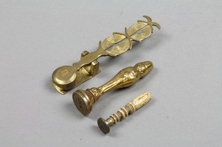 A Victorian brass sovereign balance with gilt metal terminal in the form of an acorn and a bone and brass seal 